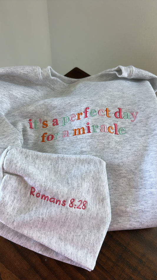 ‘It’s A Great Day For A Miracle’ Embroidered Sweatshirt - Strawberry Sunrise Colors