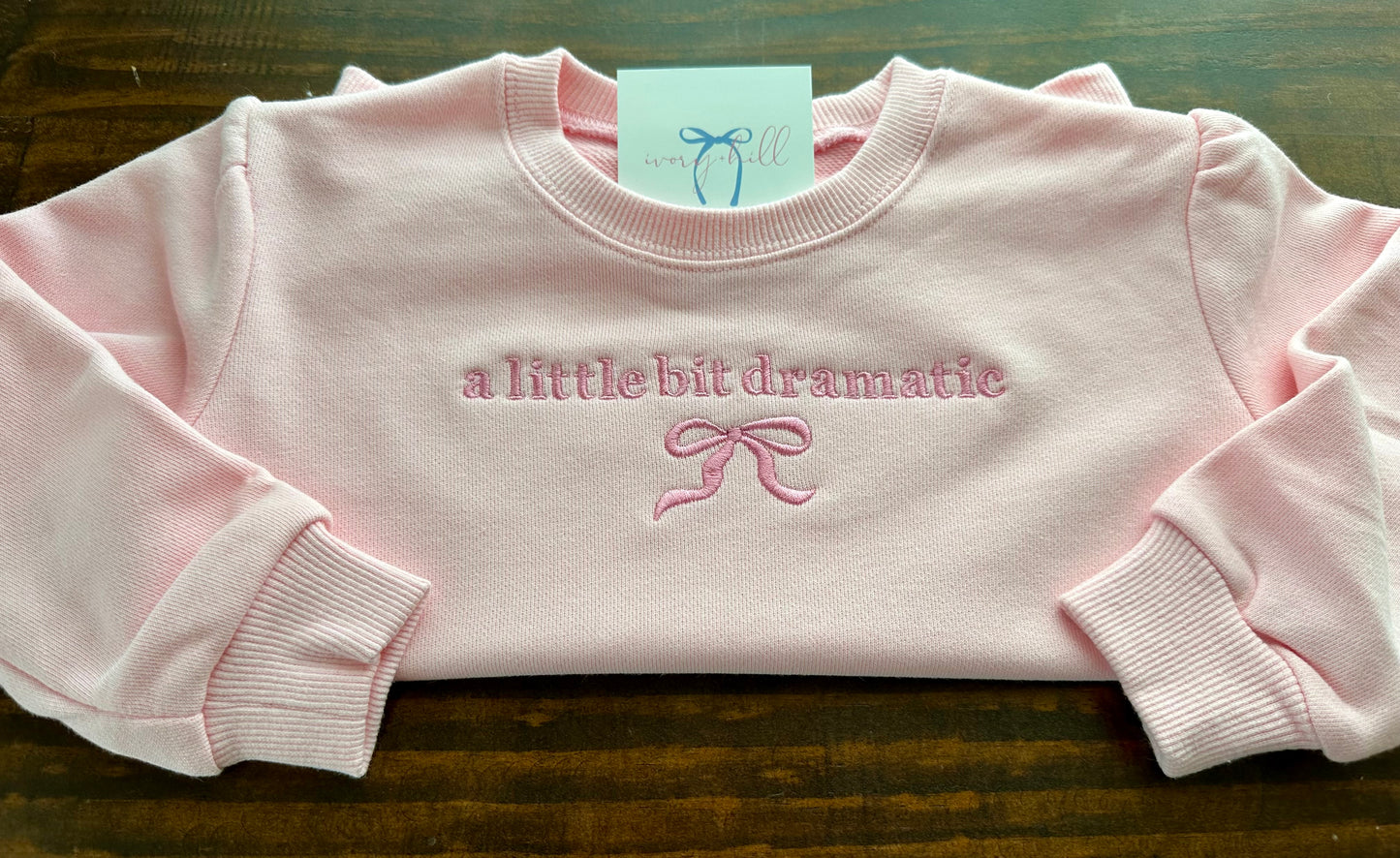 Girls ‘a little bit dramatic’ bow sweatshirt